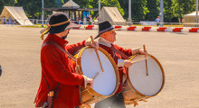 Re Enactors Drumming In The Arena